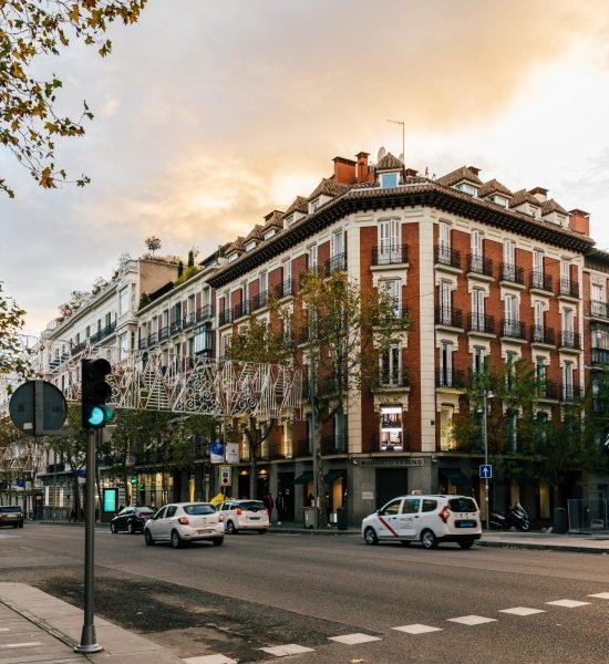 Madrid, Spain - December 6, 2020: Scenic view of Serrano Street in Salamanca District. It is a famous shopping area with luxury fashion stores